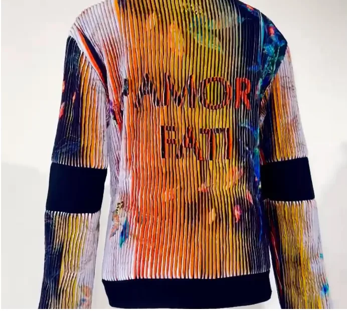The same jacket mid-turn, warm orange washing across the back.