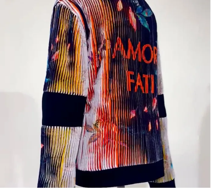 The same jacket from the other side, now dark with red lettering.